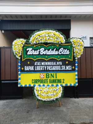 Papan Bunga Duka di Purnama