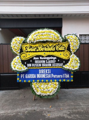 Papan Bunga Duka di Purnama