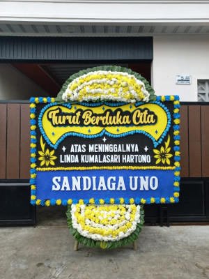Papan Bunga Duka di Purnama