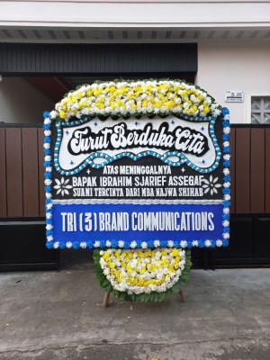 Papan Bunga Duka di Purnama